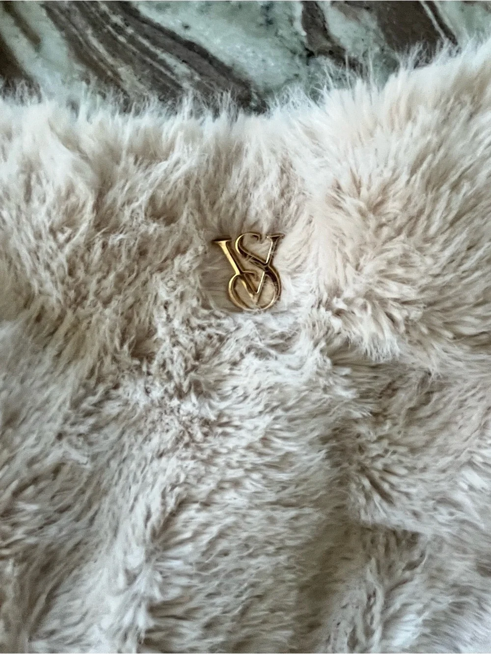 Cream Victoria’s Secret Faux-Fur Tote Bag with gold VS logo